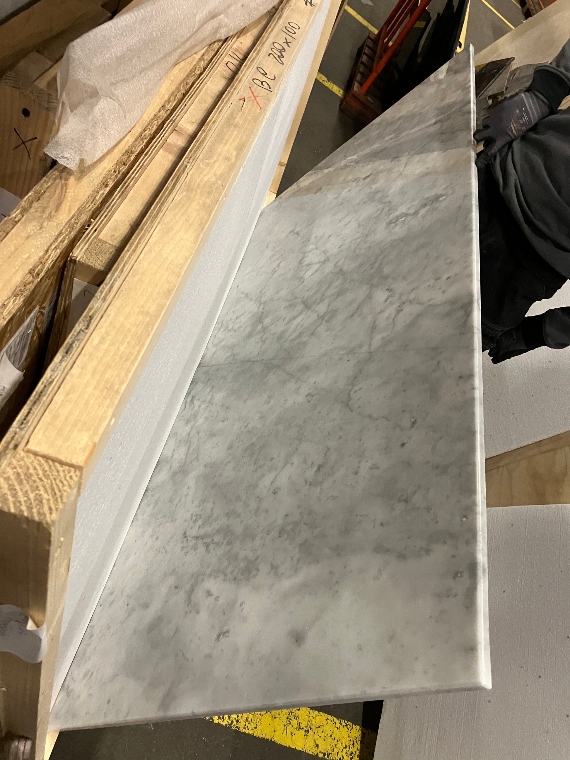 Rectangular marble dining table with four legs in Bianco Carrara White, featuring matte finish and perfect condition.