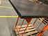 Rectangular dining table with black oak finish, chipped corner detail, 200cm length and 80cm width, by Franky.