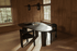 Freeform dining table in smoked oak wood with a sleek, modern design, measuring 200 cm, from the FRANKY collection.