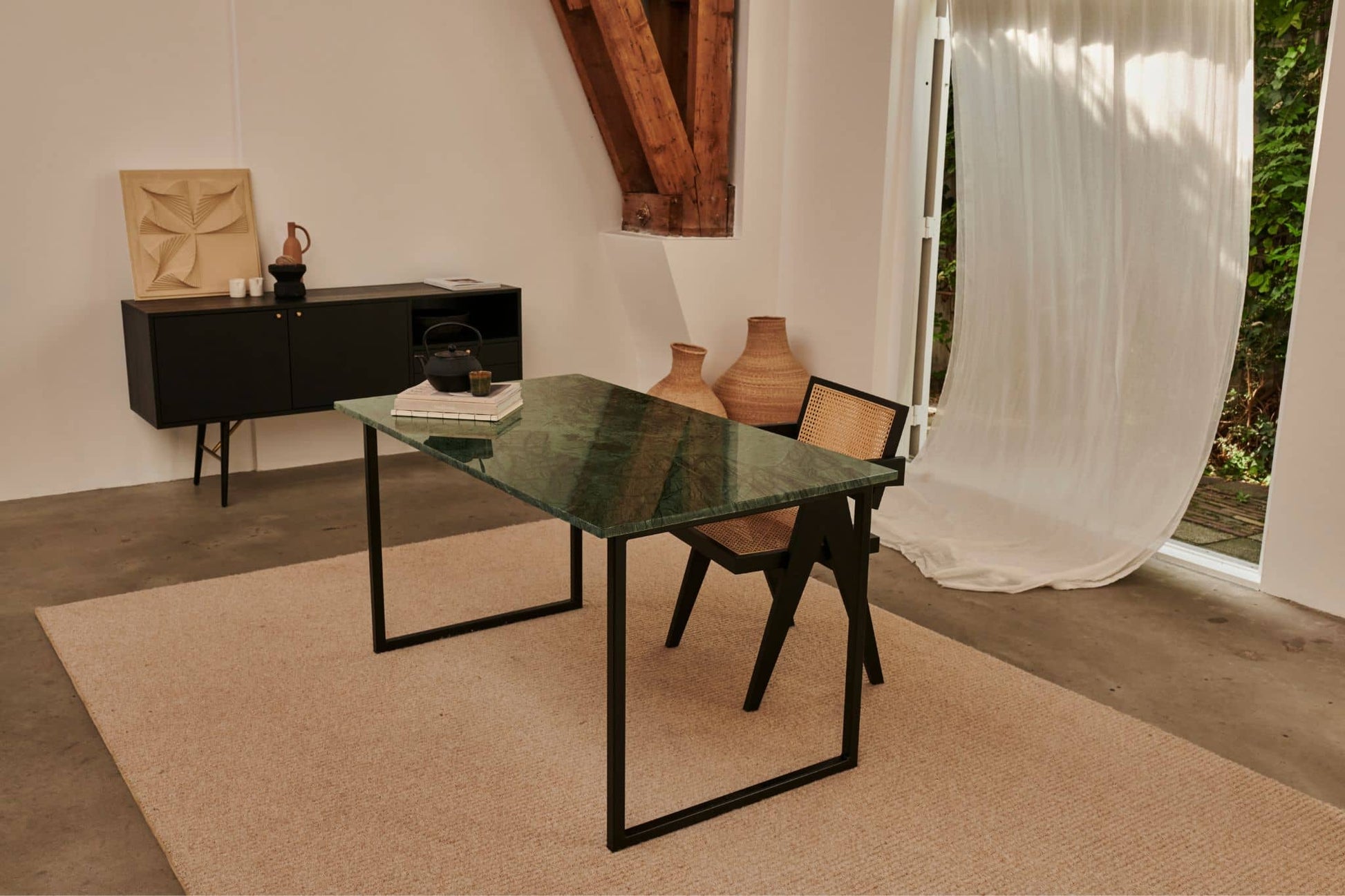 Rectangular India Green marble dining table with U-frame base, matte finish, minor splatter marks, excellent condition.