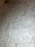 Rectangular marble dining table with four legs in Bianco Carrara white, matte finish, small scratches, 200x80 cm size.