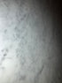 Rectangular marble dining table with four legs in Bianco Carrara White, glossy finish with minor scratches, 220x100 cm.