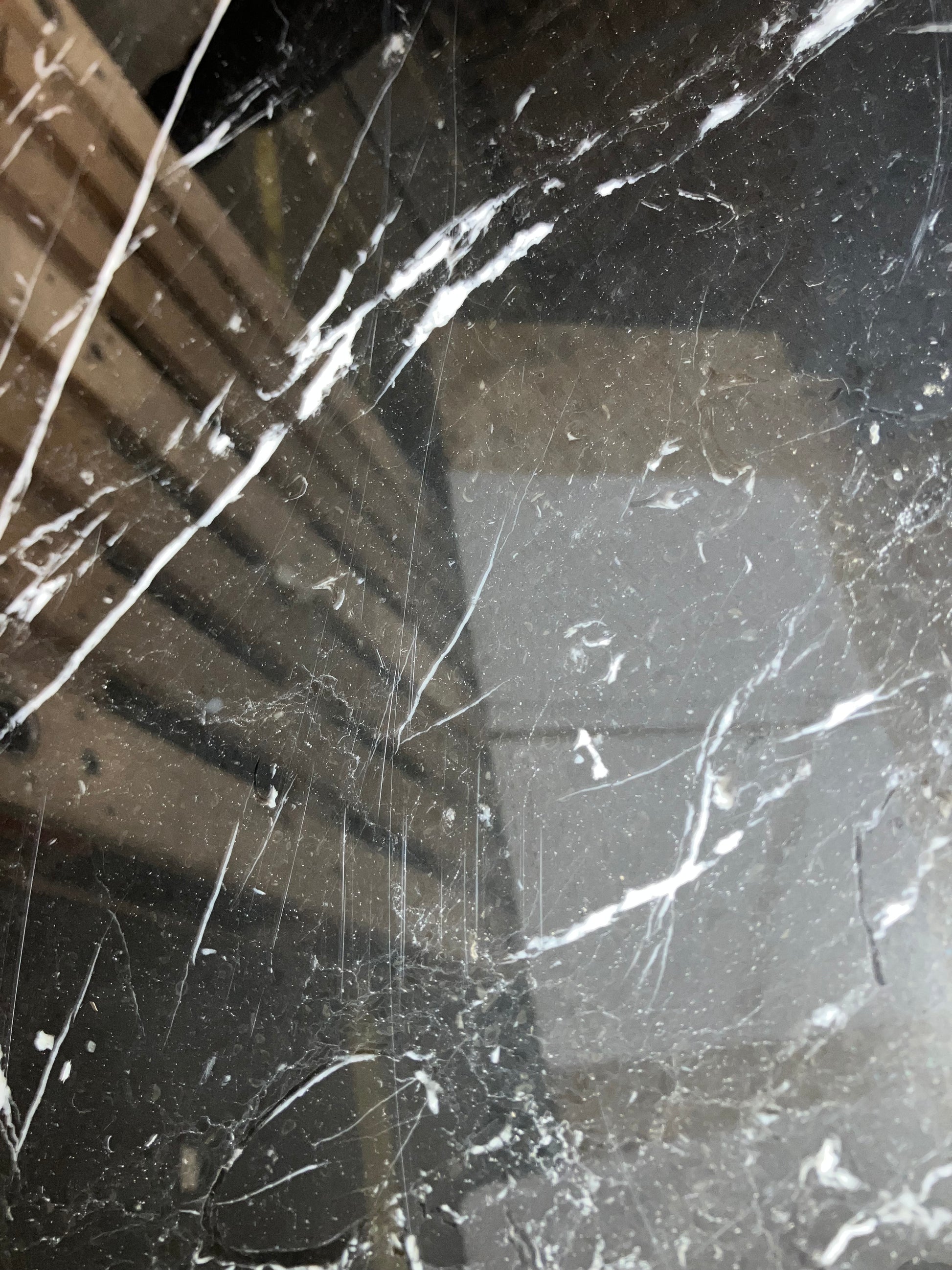 Celio Marble Dining Table by My Store, Nero Marquina black marble top with V-frame, 220x90 cm, glossy finish with minor stains and scratches.