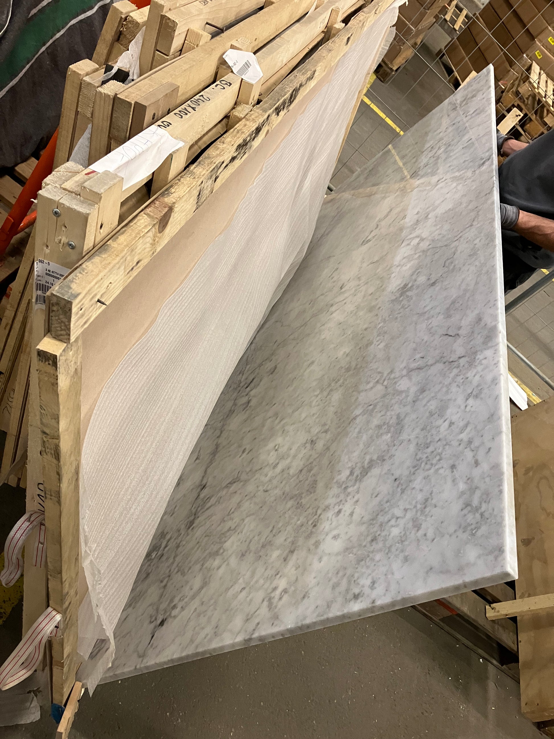 Rectangular Bianco Carrara White marble dining table with four legs, matte finish, minor edge dent, 240x100 cm size.