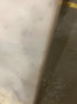 Rectangular marble dining table with four legs in Bianco Carrara White, matte finish, small edge damage visible, from My Store.
