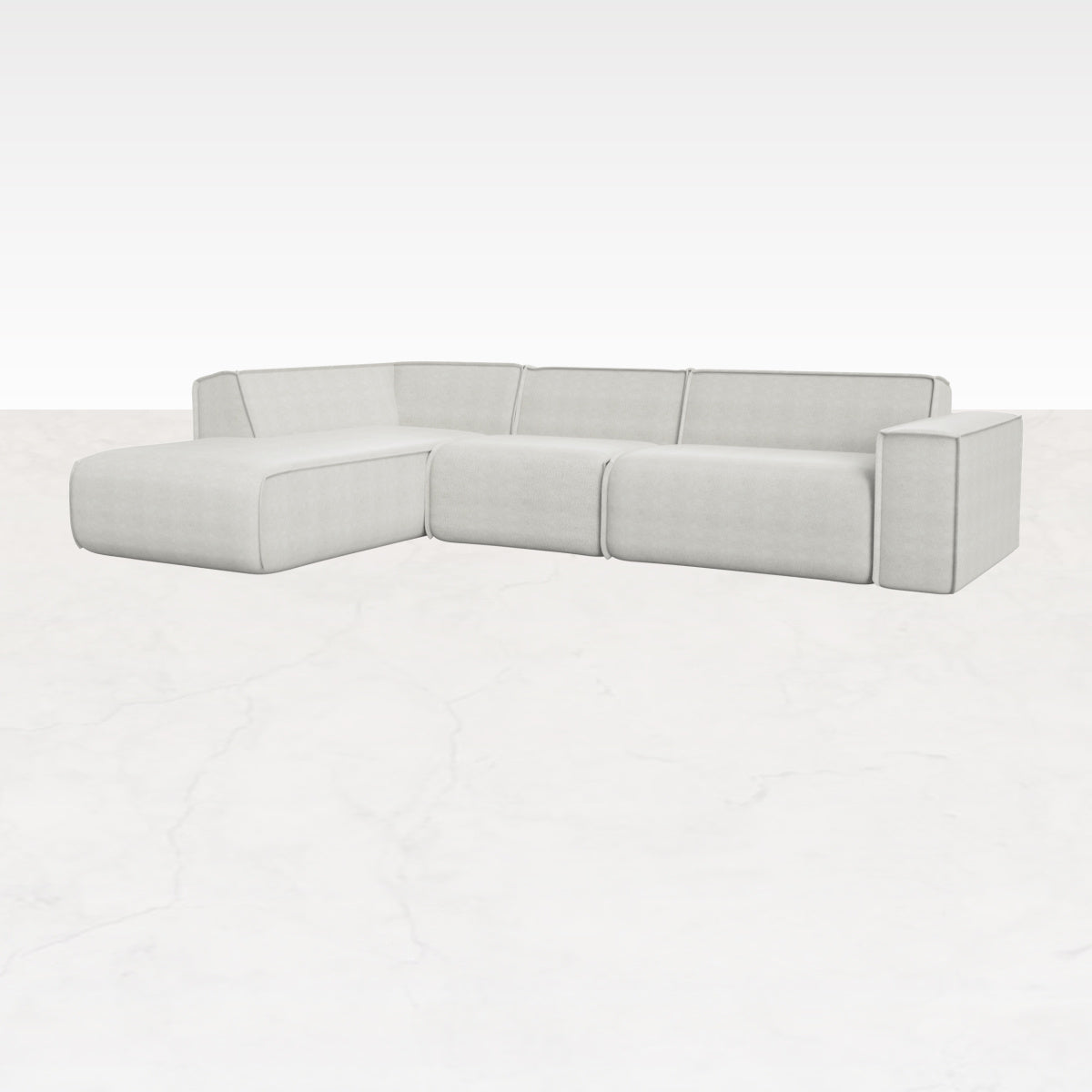 Off-white YUTO Sofa longchair left in Capucine color, featuring a modern design and plush cushions for comfortable seating.
