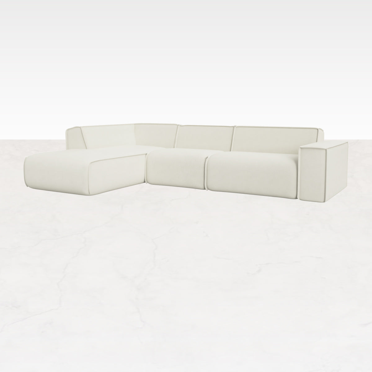 Off-white YUTO sofa longchair left in Phoebe fabric, three-seater modern sofa with clean design and plush cushions.