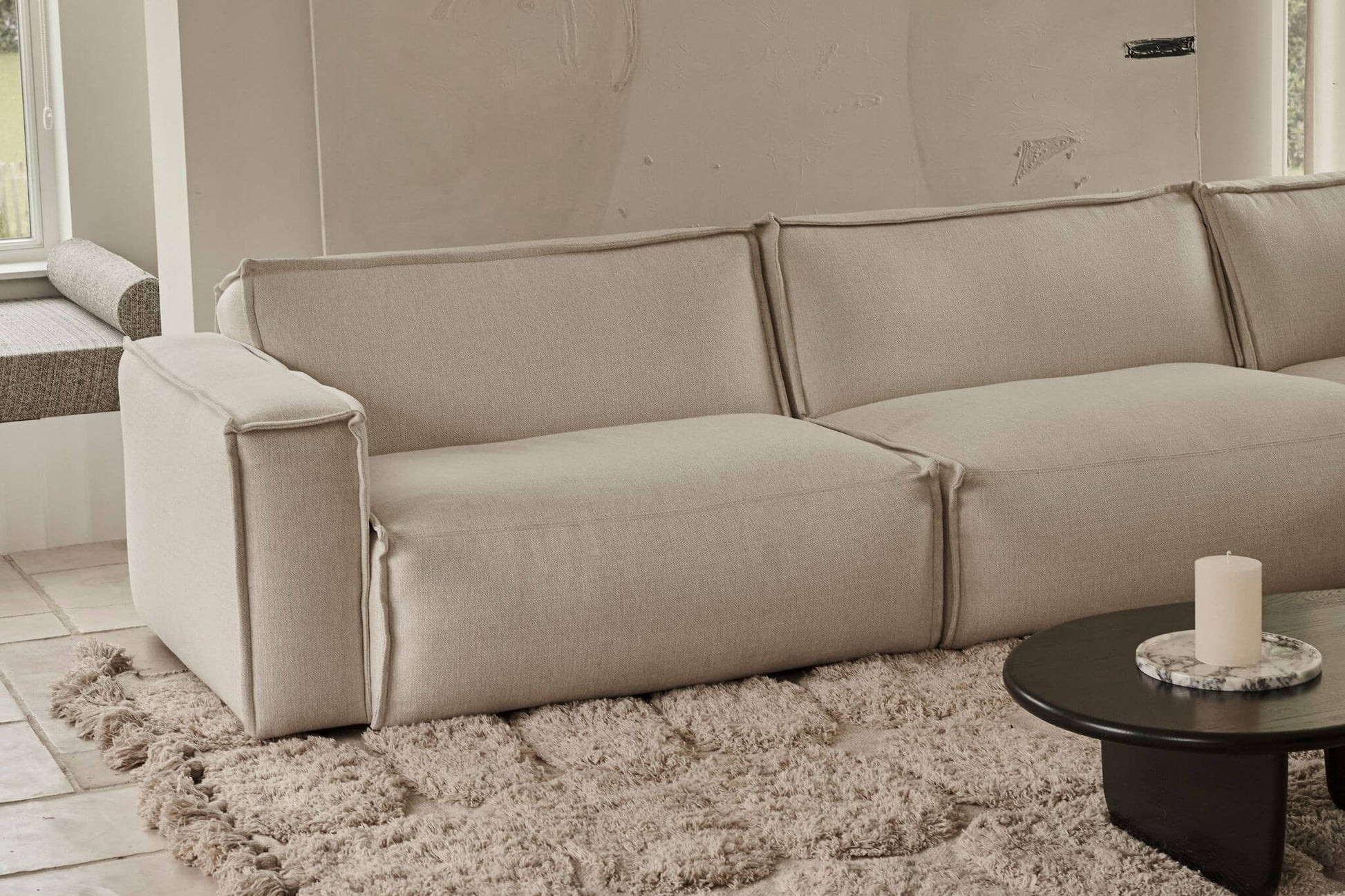 YUTO sofa Phoebe Smokey Taupe longchair left in living room, featuring plush fabric and modern design for comfortable seating.