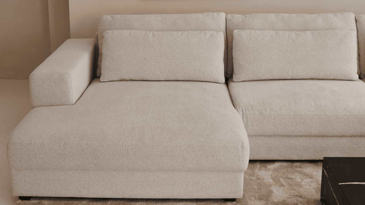 Dark grey MINATO sofa with right-side longchair, featuring sleek design and plush cushions, perfect for modern living rooms.