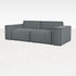 Ocean grey YUTO sofa by My Store, three-seater with plush cushions and modern design, shown in a cozy living room setting.
