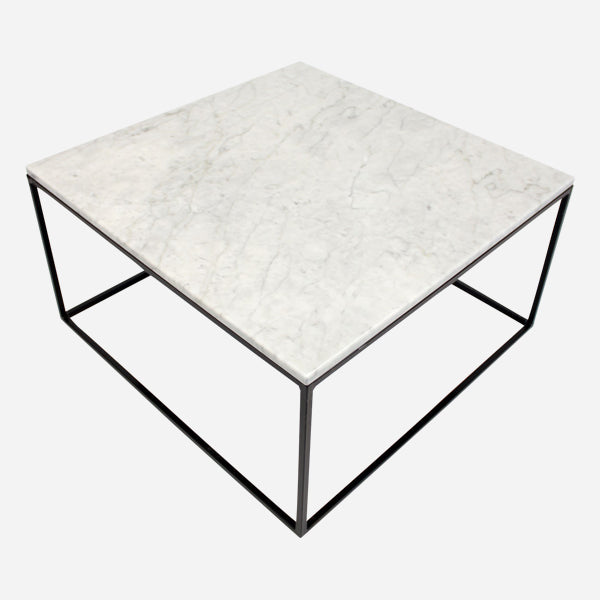 Square marble coffee table with glossy Bianco Carrara white surface and sleek modern design.