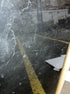 Square Nero Marquina black marble coffee table with glossy finish and subtle scratches, 80x80 cm, by My Store.