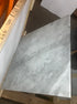 Square marble coffee table in Bianco Carrara white with matte finish and small ring stain, 80x80 cm, by My Store.