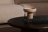 Decorative bowl from ARTIFAKT collection in travertine, showcasing natural stone texture and elegant design.