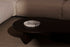 Round ARTIFAKT collection tray in Amarante color featuring a sleek design, ideal for serving or decorative use.