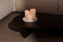 Round tray from the ARTIFAKT collection in Amarante, featuring a stylish and functional design with vibrant color.