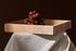Artifakt Collection squared tray made of natural travertine with a sleek, modern design for stylish home organization.