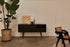 Black oak KINO sideboard with sleek modern design, featuring spacious storage and minimalist style.