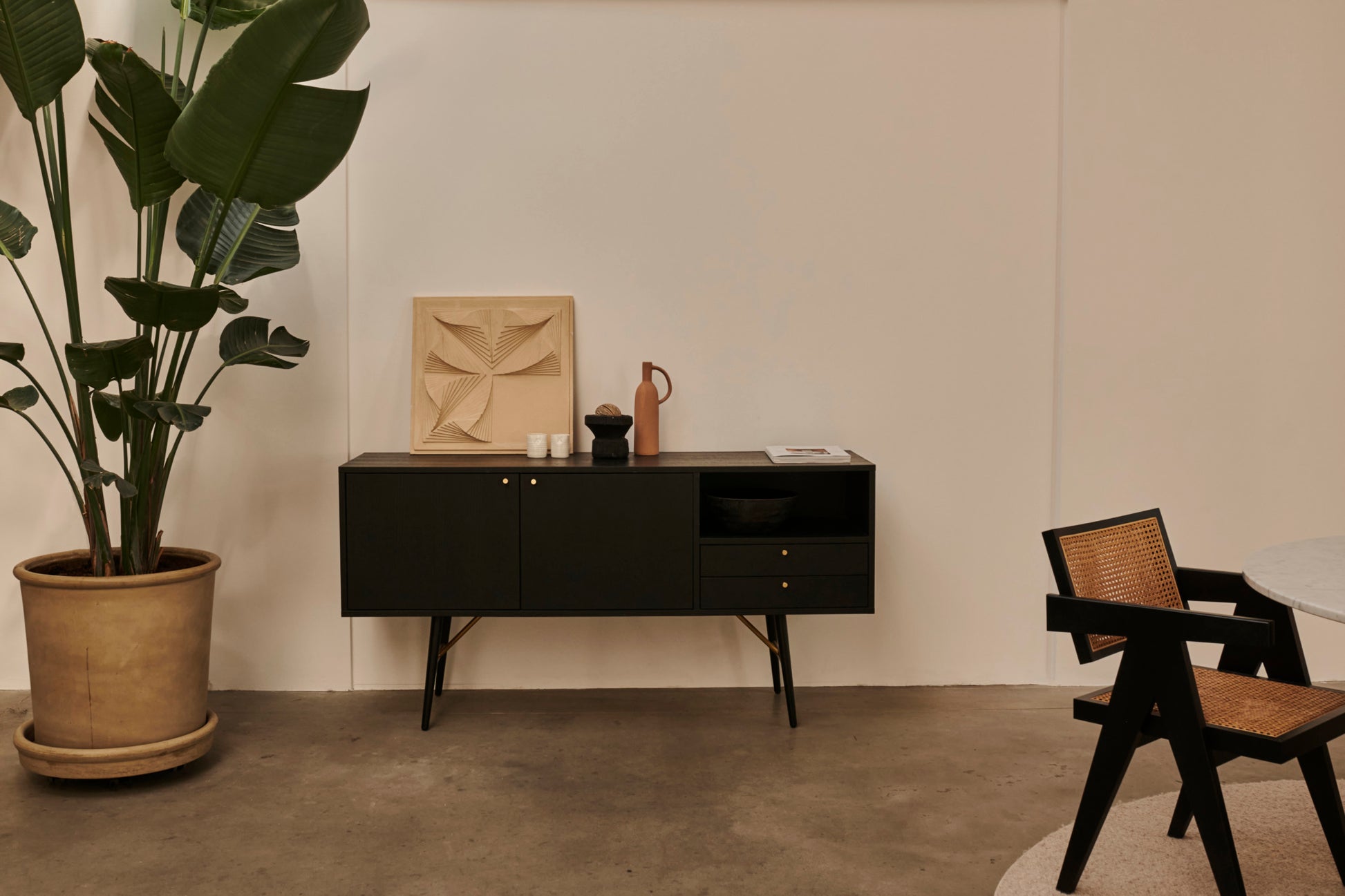 Black oak KINO sideboard with sleek modern design, featuring spacious storage and minimalist style.