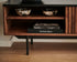 Brown walnut KOMO TV cabinet with sleek design and storage space, perfect for modern living room setup.