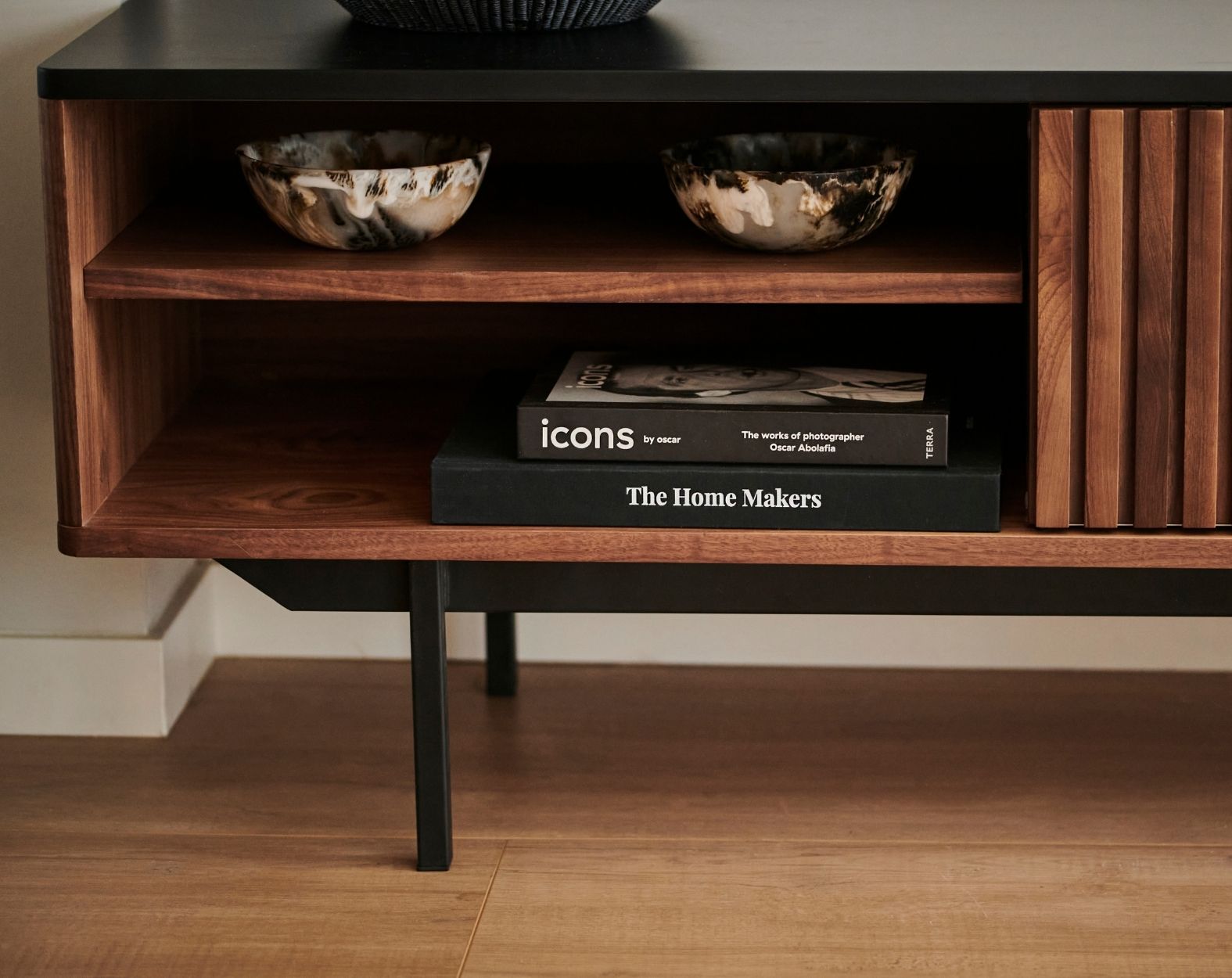 Brown walnut KOMO TV cabinet with sleek design and storage space, perfect for modern living room setup.