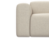 Nollie Monza 00 Ivory armchair with plush fabric upholstery and modern design, featuring a comfortable cushioned seat and wooden legs.