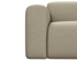 Beige Nollie Monza 06 armchair with modern design, upholstered in soft fabric, featuring a cozy, stylish seating option.