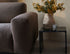 Nollie Monza 07 Earth armchair with plush fabric and modern design, showcasing a comfortable, stylish seating option.