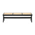 Black rattan bench named Pierre with a sturdy frame and woven rattan seating, designed for stylish outdoor or indoor use.