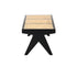 Black rattan bench named Pierre with a sturdy frame and woven seat, ideal for indoor or outdoor seating.