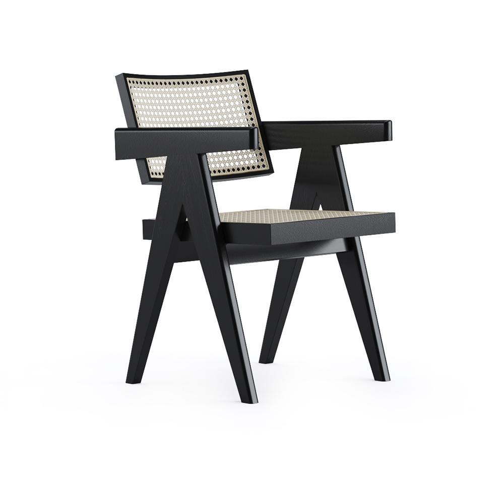 Black rattan dining chair named Pierre, with a sleek design and sturdy frame, perfect for modern dining rooms.