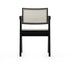 Black rattan dining chair named Pierre with a sleek design, perfect for modern dining rooms.