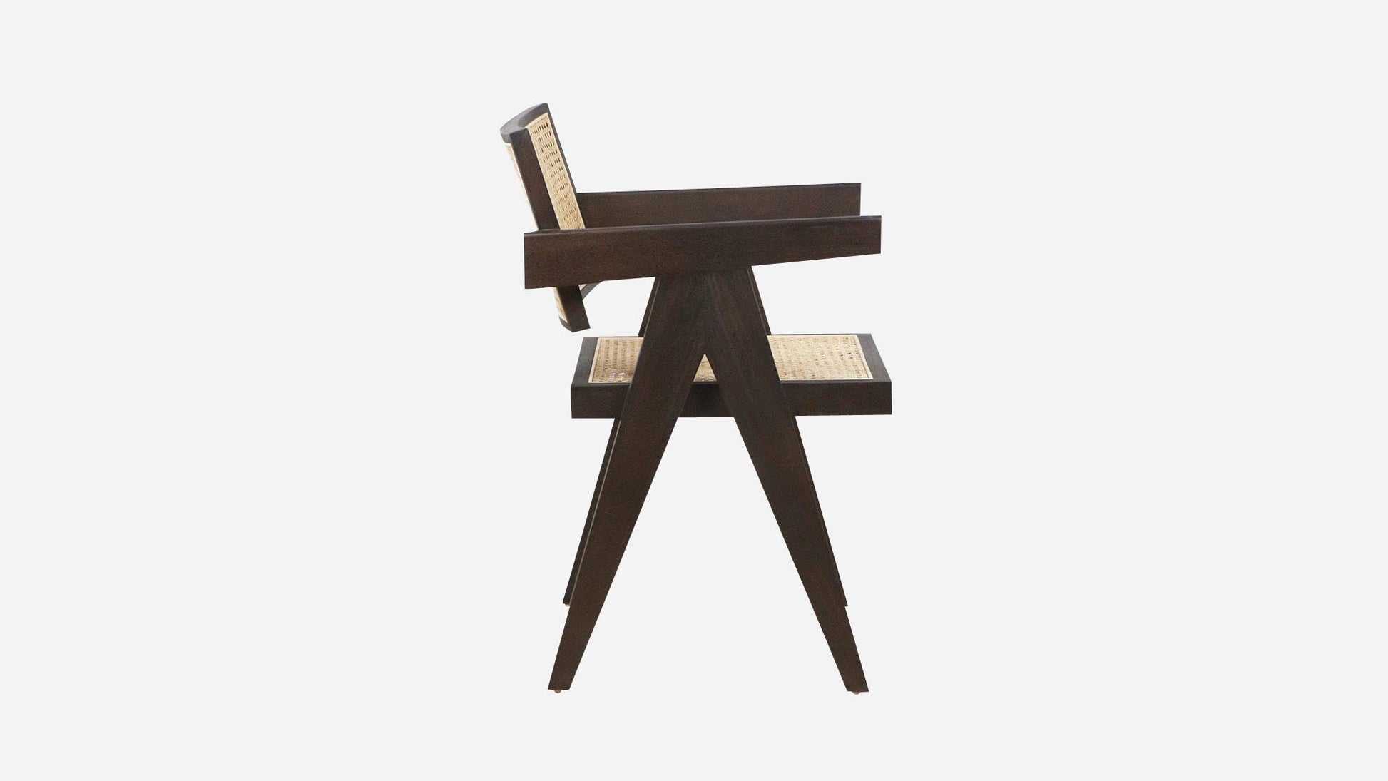 Dark brown rattan dining chair named Pierre with a sleek design, ideal for stylish dining room decor.