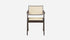 Dark brown rattan dining chair named Pierre featuring a stylish woven design and sturdy wooden legs.