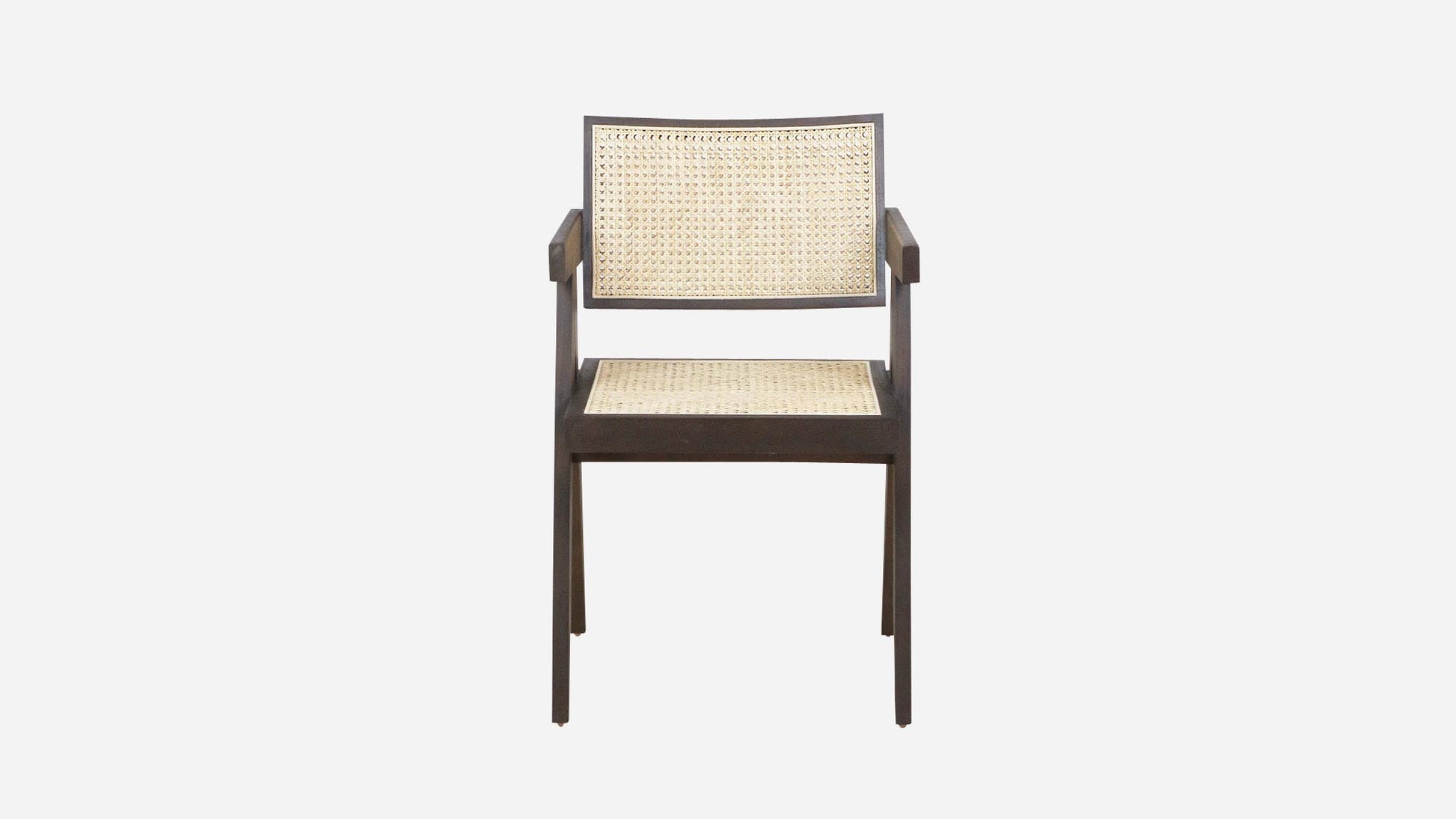 Dark brown rattan dining chair named Pierre featuring a stylish woven design and sturdy wooden legs.