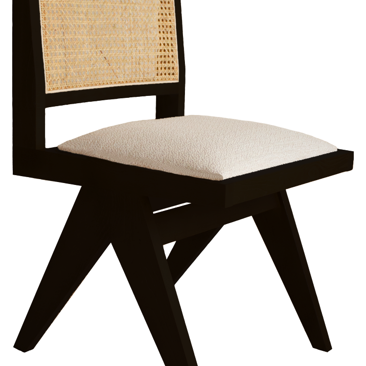 Black rattan dining chair with upholstered seat, Pierre style, without armrests, showcasing a modern, minimalist design.