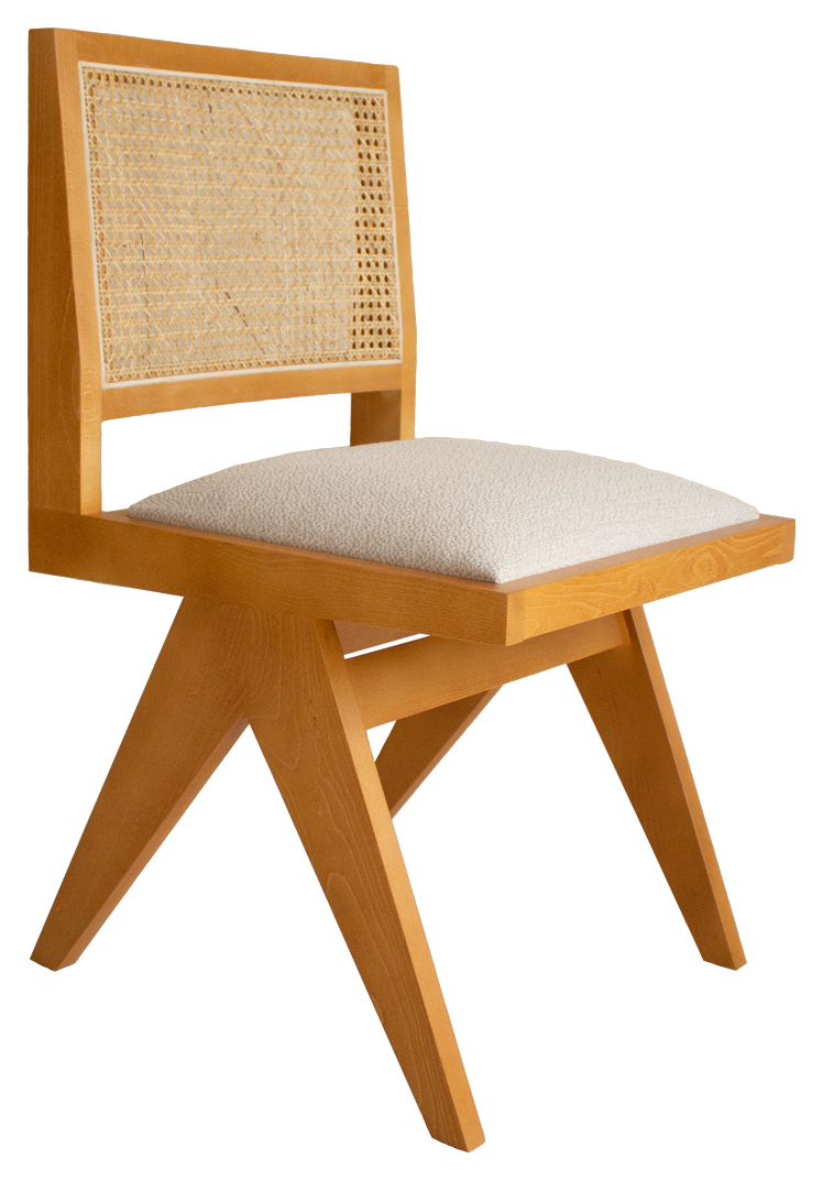Brown rattan dining chair with upholstered seat, Pierre brand, sleek armrest-free design for stylish dining room seating.