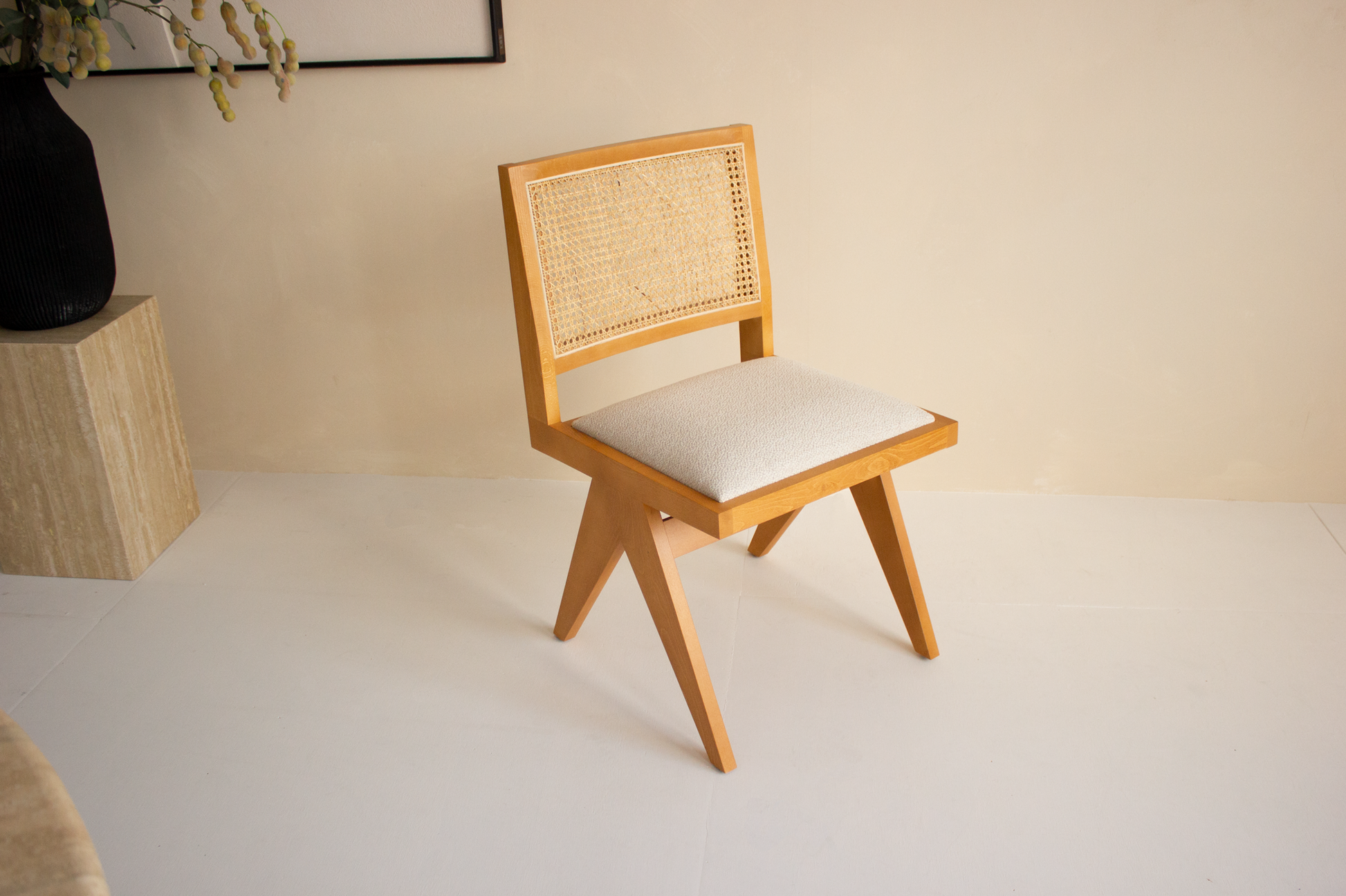 Brown rattan dining chair with upholstered seat and no armrests, model Pierre, from My Store, ideal for modern dining rooms.