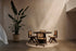 Black rattan dining chair without armrests, Pierre design by My Store, featuring a sleek, modern look with woven rattan texture.
