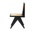 Black rattan dining chair without armrests, Pierre model, showcasing a modern, woven design perfect for contemporary dining spaces.