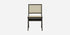 Dark brown rattan dining chair without armrests, model Pierre, showcasing a stylish and modern design for dining room decor.