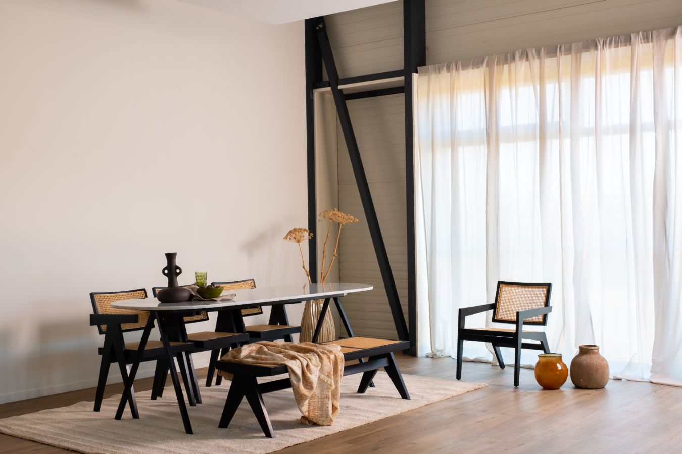 Black Rattan Fauteuil Pierre from My Store with a stylish woven design and comfortable armrests, perfect for modern indoor or outdoor spaces.