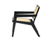 Black rattan fauteuil Pierre chair with a modern design, featuring a sturdy frame and woven rattan seating for stylish comfort.