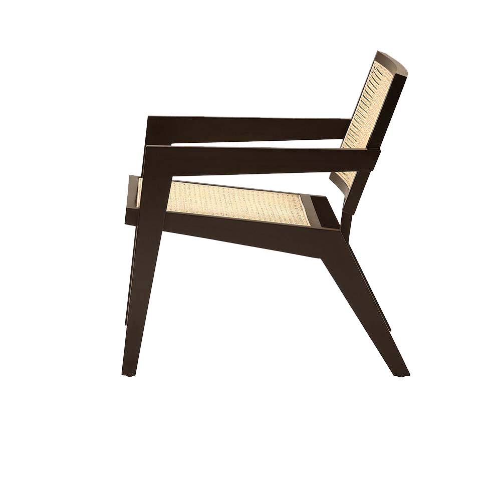 Dark brown rattan fauteuil named Pierre with a curved design, perfect for stylish indoor or outdoor seating.