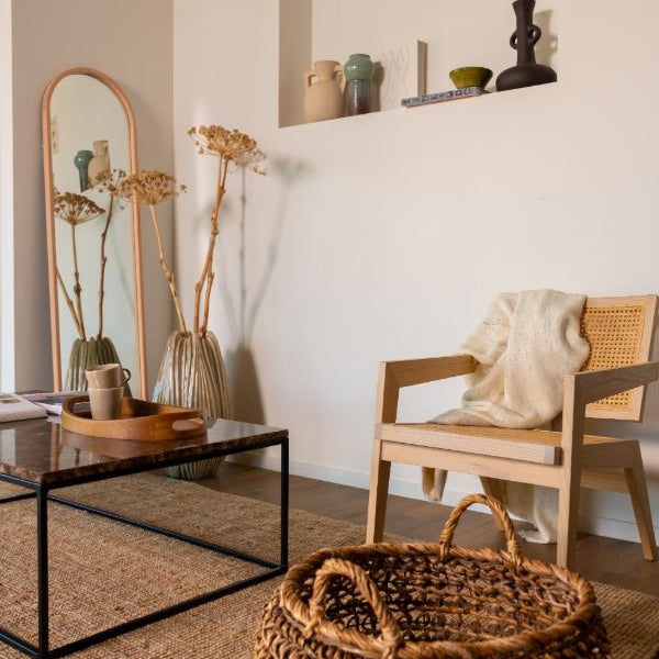 Natural rattan fauteuil Pierre by My Store featuring a curved design and woven rattan construction for stylish comfort.
