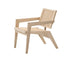 Natural rattan fauteuil chair named Pierre with a woven design, featuring a sturdy frame and comfortable seating.