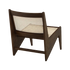 Dark brown rattan Kangaroo Chair named Pierre with a curved seat and sturdy frame, perfect for stylish indoor or outdoor seating.