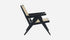 Black Rattan Lounge Chair named Pierre with a modern design, featuring a comfortable seat and stylish frame.