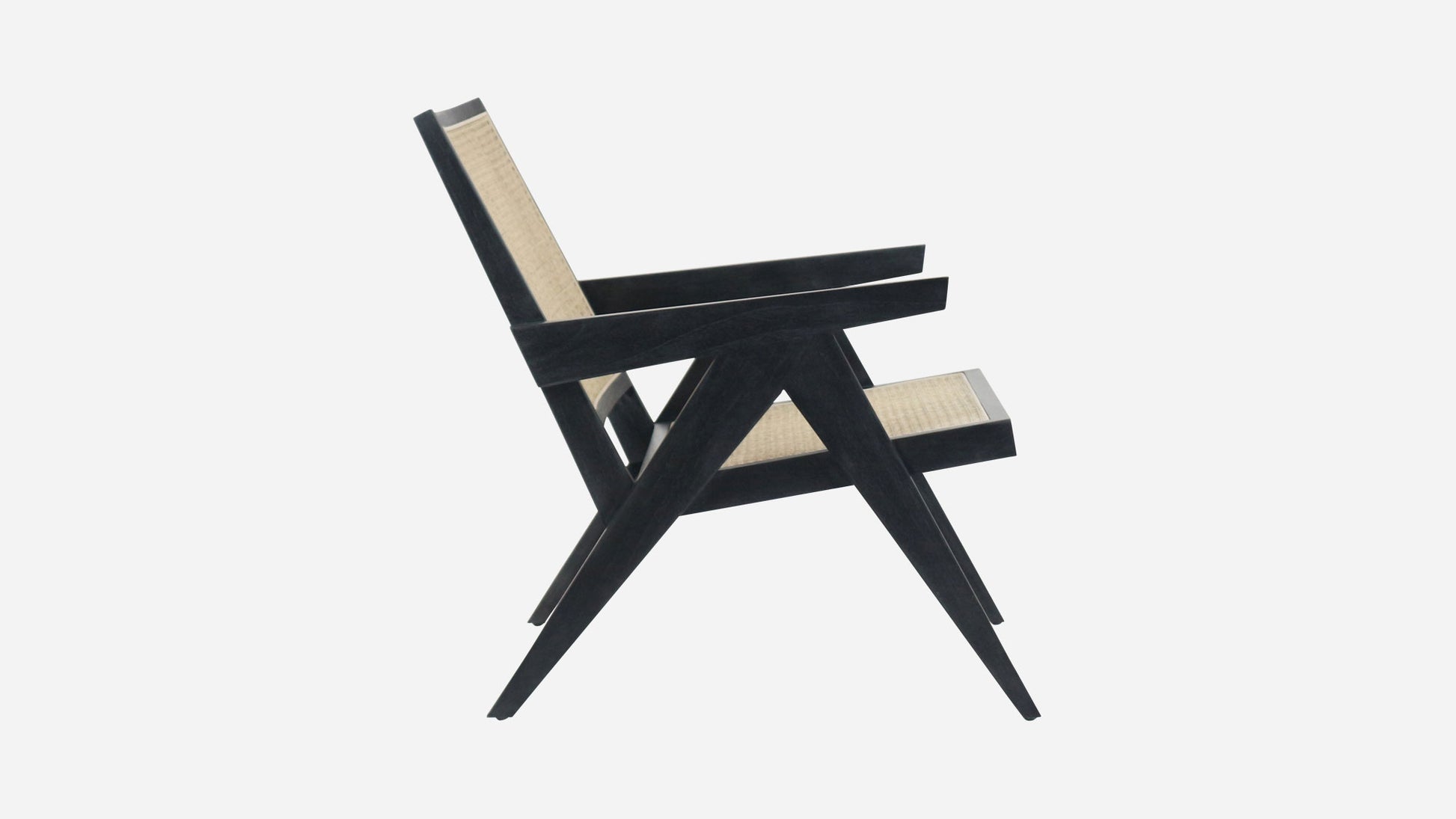 Black Rattan Lounge Chair named Pierre with a modern design, featuring a comfortable seat and stylish frame.