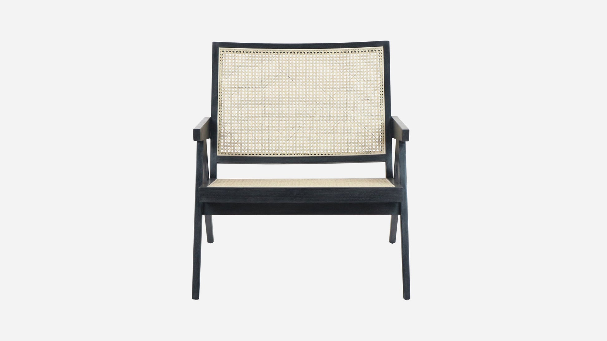 Black rattan lounge chair named Pierre with a modern design, suitable for indoor or outdoor relaxation spaces.